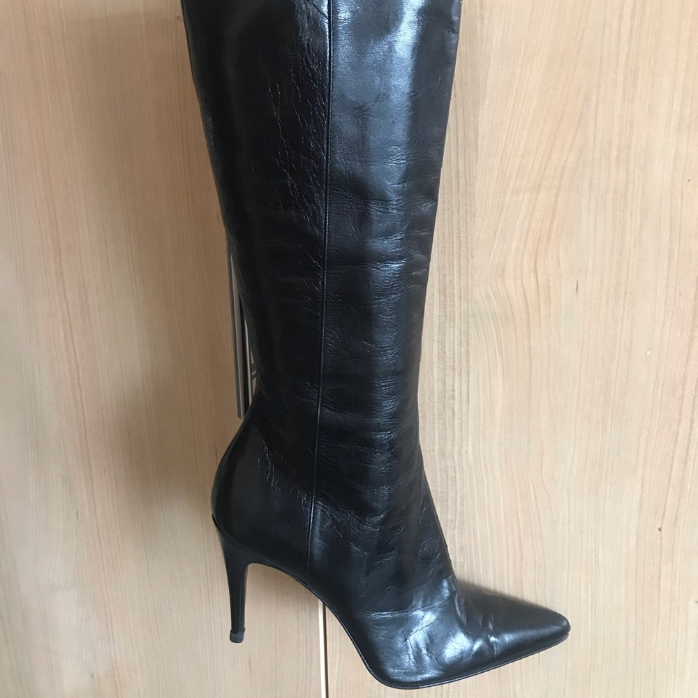 Knee high black leather boots